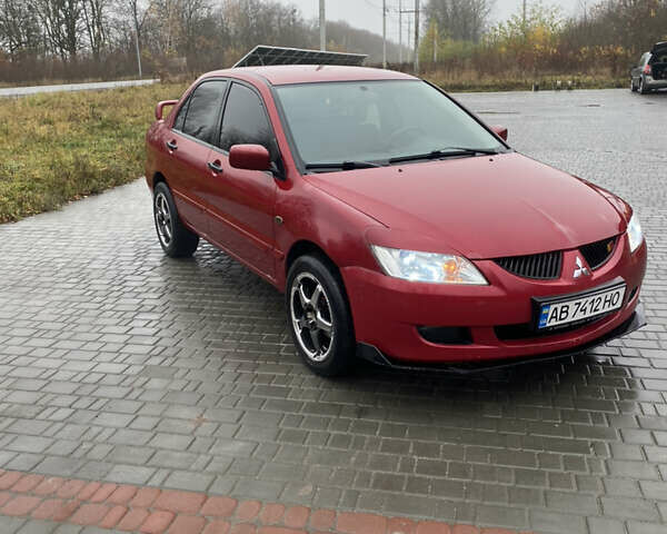 Червоний Міцубісі Lancer, об'ємом двигуна 1.58 л та пробігом 350 тис. км за 3600 $, фото 1 на Automoto.ua