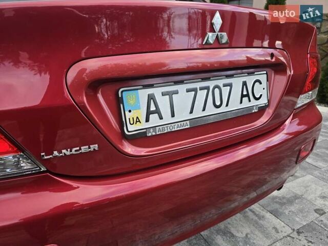 Червоний Міцубісі Lancer, об'ємом двигуна 1.6 л та пробігом 249 тис. км за 5200 $, фото 38 на Automoto.ua