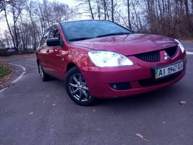 Красный Мицубиси Лансер, объемом двигателя 1.6 л и пробегом 450 тыс. км за 2850 $, фото 2 на Automoto.ua