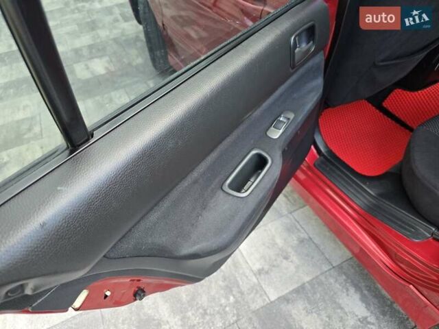 Червоний Міцубісі Lancer, об'ємом двигуна 1.6 л та пробігом 249 тис. км за 5200 $, фото 19 на Automoto.ua