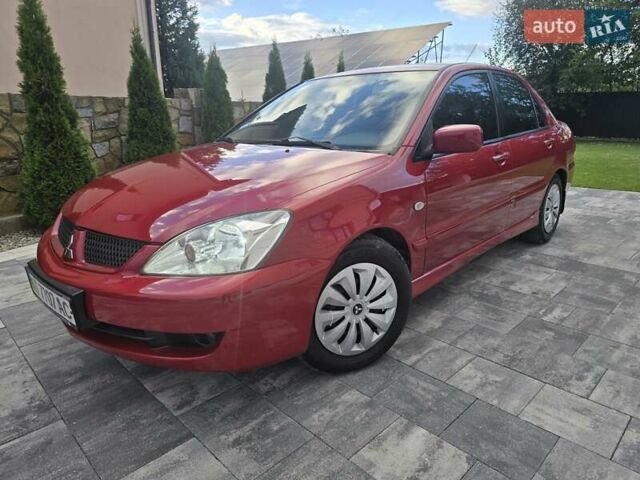Червоний Міцубісі Lancer, об'ємом двигуна 1.6 л та пробігом 249 тис. км за 5200 $, фото 55 на Automoto.ua