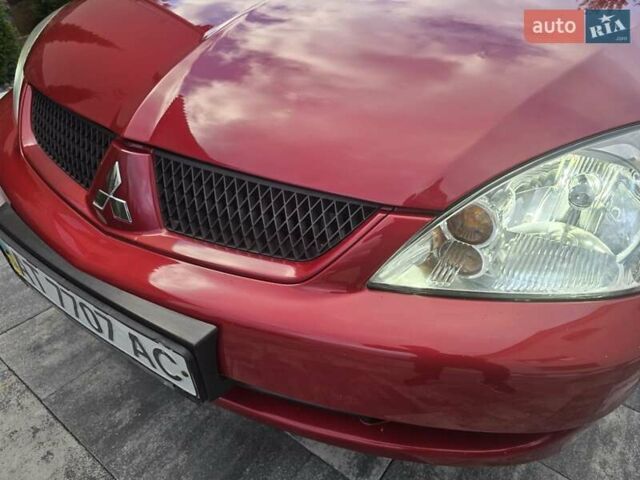 Червоний Міцубісі Lancer, об'ємом двигуна 1.6 л та пробігом 249 тис. км за 5200 $, фото 39 на Automoto.ua
