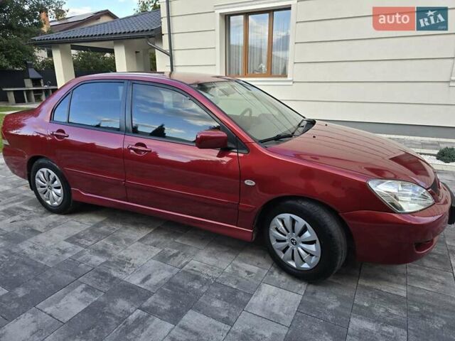 Червоний Міцубісі Lancer, об'ємом двигуна 1.6 л та пробігом 249 тис. км за 5200 $, фото 2 на Automoto.ua