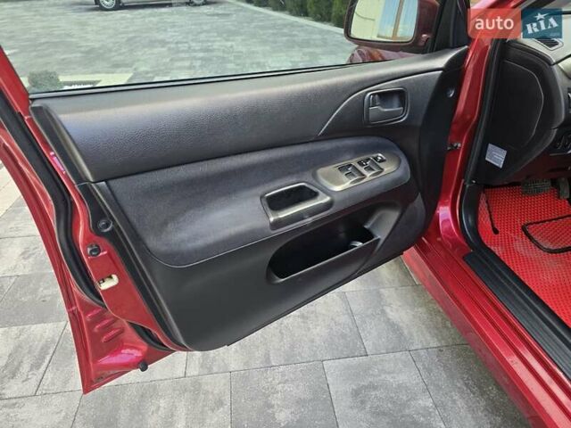 Червоний Міцубісі Lancer, об'ємом двигуна 1.6 л та пробігом 249 тис. км за 5200 $, фото 9 на Automoto.ua