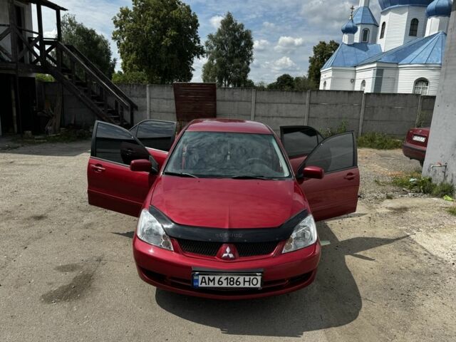 Красный Мицубиси Лансер, объемом двигателя 1.6 л и пробегом 250 тыс. км за 4200 $, фото 9 на Automoto.ua