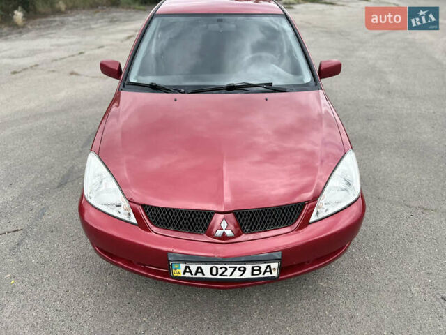 Червоний Міцубісі Lancer, об'ємом двигуна 1.6 л та пробігом 249 тис. км за 4250 $, фото 4 на Automoto.ua