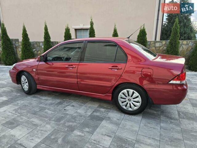 Червоний Міцубісі Lancer, об'ємом двигуна 1.6 л та пробігом 249 тис. км за 5200 $, фото 8 на Automoto.ua