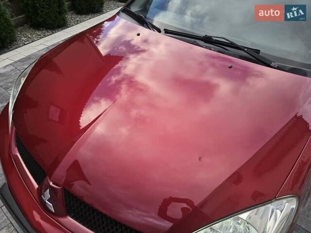 Червоний Міцубісі Lancer, об'ємом двигуна 1.6 л та пробігом 249 тис. км за 5200 $, фото 36 на Automoto.ua