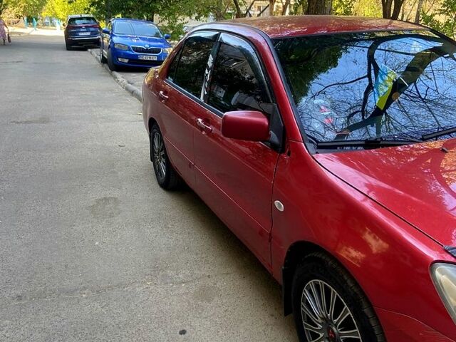 Червоний Міцубісі Lancer, об'ємом двигуна 1.6 л та пробігом 0 тис. км за 4500 $, фото 4 на Automoto.ua