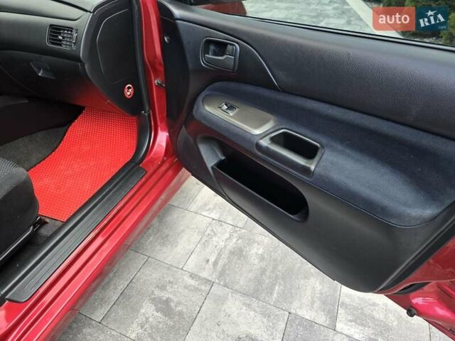 Червоний Міцубісі Lancer, об'ємом двигуна 1.6 л та пробігом 249 тис. км за 5200 $, фото 22 на Automoto.ua
