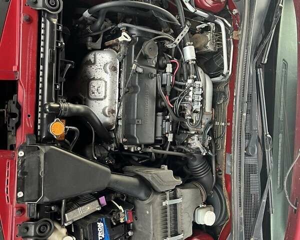 Красный Мицубиси Лансер, объемом двигателя 1.58 л и пробегом 250 тыс. км за 3999 $, фото 17 на Automoto.ua