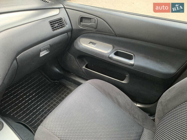 Червоний Міцубісі Lancer, об'ємом двигуна 1.6 л та пробігом 249 тис. км за 4250 $, фото 17 на Automoto.ua