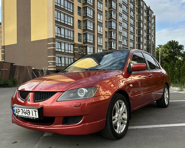 Красный Мицубиси Лансер, объемом двигателя 1.6 л и пробегом 331 тыс. км за 3700 $, фото 6 на Automoto.ua