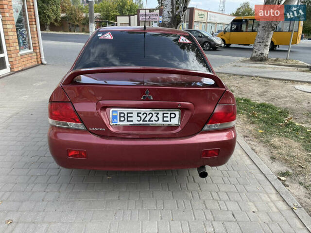 Червоний Міцубісі Lancer, об'ємом двигуна 1.58 л та пробігом 290 тис. км за 4250 $, фото 7 на Automoto.ua