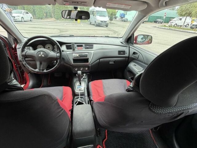 Червоний Міцубісі Lancer, об'ємом двигуна 1.6 л та пробігом 324 тис. км за 3299 $, фото 4 на Automoto.ua