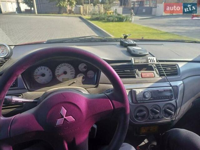 Красный Мицубиси Лансер, объемом двигателя 1.6 л и пробегом 73 тыс. км за 5500 $, фото 3 на Automoto.ua