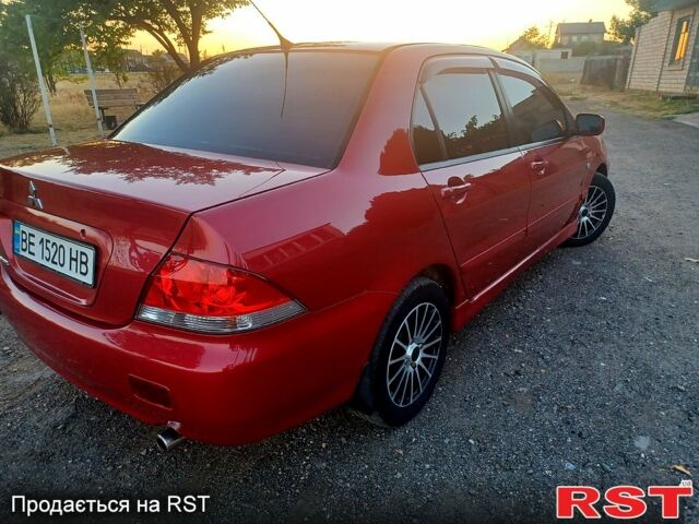 Мицубиси Лансер 2006 в Николаеве на Automoto.ua Красный Мицубиси Лансер, объемом двигателя 1.6 л и пробегом 260 тыс. км за 4600 $, фото 5 на Automoto.ua