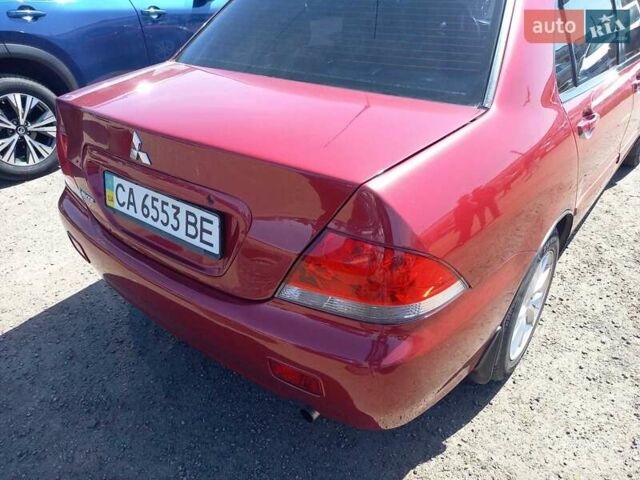 Червоний Міцубісі Lancer, об'ємом двигуна 1.6 л та пробігом 156 тис. км за 5200 $, фото 7 на Automoto.ua