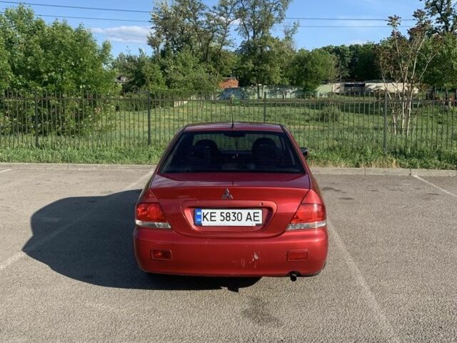 Червоний Міцубісі Lancer, об'ємом двигуна 1.6 л та пробігом 490 тис. км за 4000 $, фото 3 на Automoto.ua