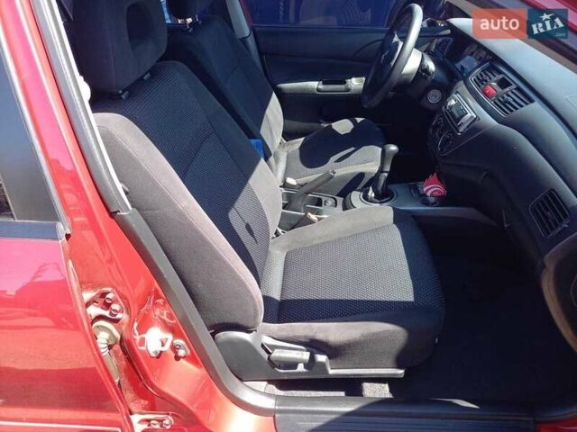 Червоний Міцубісі Lancer, об'ємом двигуна 1.6 л та пробігом 156 тис. км за 5200 $, фото 19 на Automoto.ua