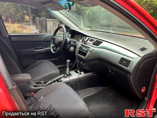 Червоний Міцубісі Lancer, об'ємом двигуна 1.6 л та пробігом 283 тис. км за 3500 $, фото 2 на Automoto.ua
