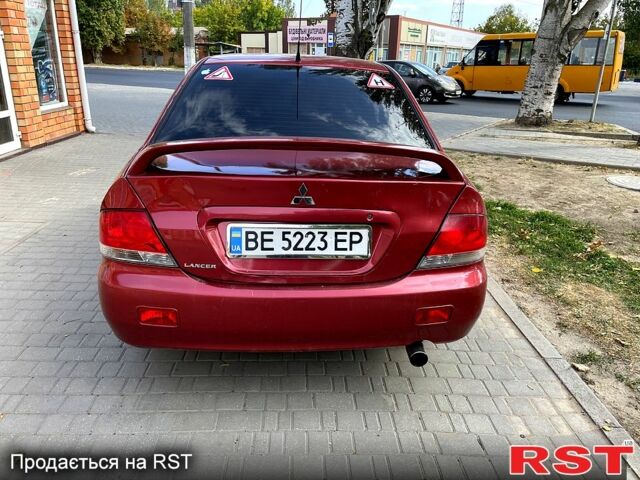 Червоний Міцубісі Lancer, об'ємом двигуна 1.6 л та пробігом 290 тис. км за 4250 $, фото 2 на Automoto.ua