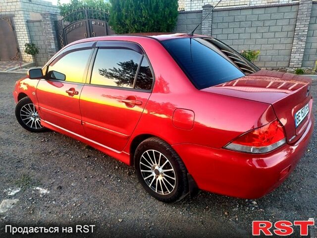 Мицубиси Лансер 2006 в Николаеве на Automoto.ua Красный Мицубиси Лансер, объемом двигателя 1.6 л и пробегом 260 тыс. км за 4600 $, фото 2 на Automoto.ua