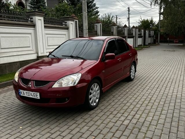 Червоний Міцубісі Lancer, об'ємом двигуна 1.6 л та пробігом 270 тис. км за 2200 $, фото 3 на Automoto.ua