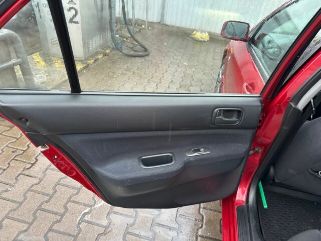 Червоний Міцубісі Lancer, об'ємом двигуна 1.6 л та пробігом 185 тис. км за 5000 $, фото 11 на Automoto.ua