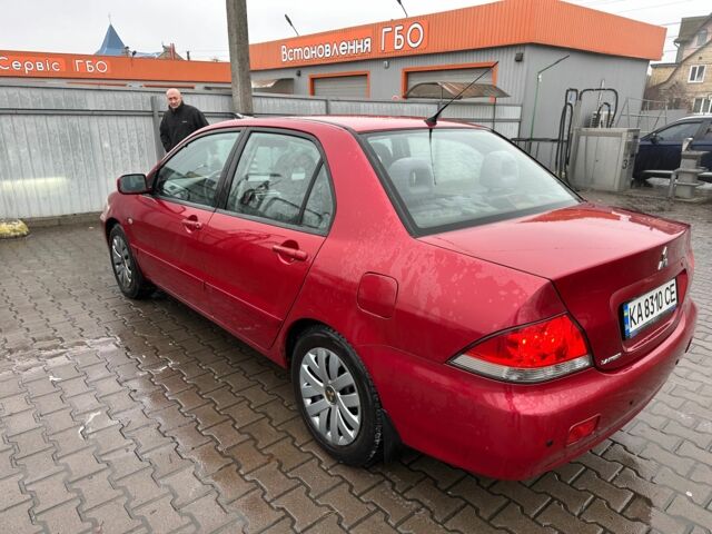 Червоний Міцубісі Lancer, об'ємом двигуна 1.6 л та пробігом 185 тис. км за 5000 $, фото 3 на Automoto.ua