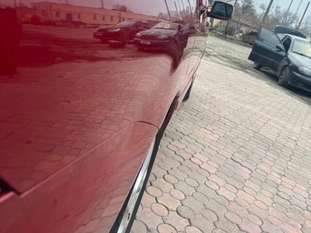 Красный Мицубиси Лансер, объемом двигателя 1.6 л и пробегом 276 тыс. км за 4350 $, фото 7 на Automoto.ua