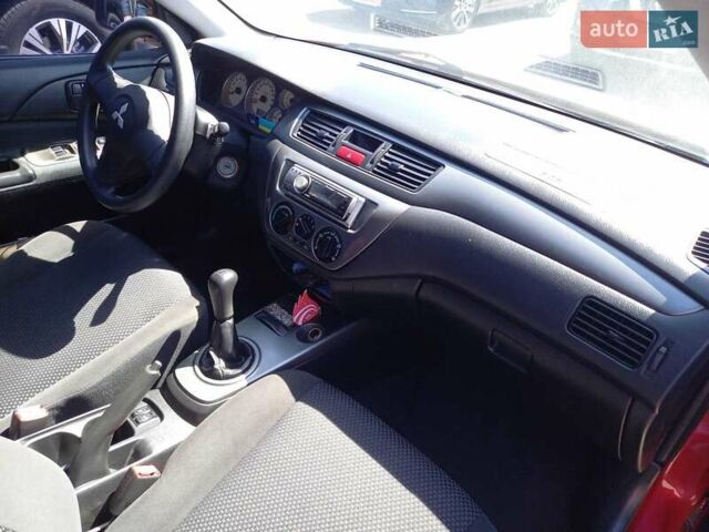 Червоний Міцубісі Lancer, об'ємом двигуна 1.6 л та пробігом 156 тис. км за 5200 $, фото 18 на Automoto.ua