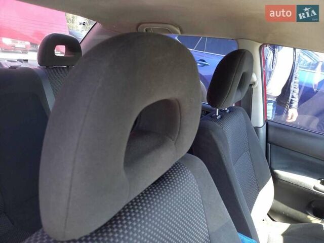 Червоний Міцубісі Lancer, об'ємом двигуна 1.6 л та пробігом 156 тис. км за 5200 $, фото 21 на Automoto.ua