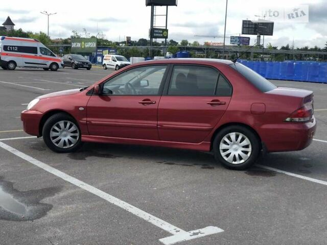 Червоний Міцубісі Lancer, об'ємом двигуна 1.6 л та пробігом 290 тис. км за 4300 $, фото 1 на Automoto.ua