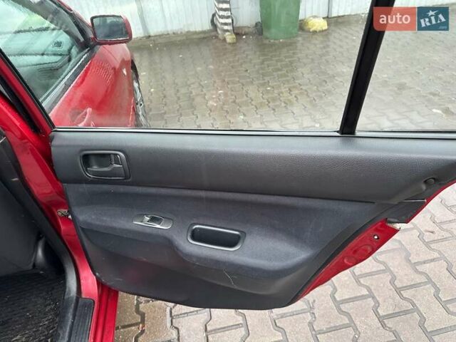 Красный Мицубиси Лансер, объемом двигателя 1.6 л и пробегом 185 тыс. км за 5000 $, фото 8 на Automoto.ua