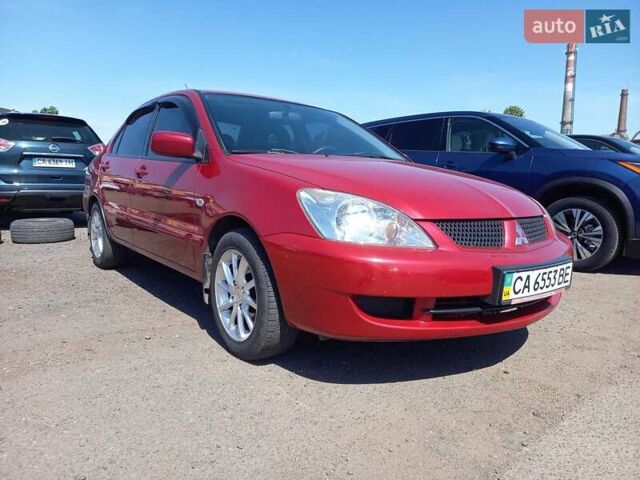 Червоний Міцубісі Lancer, об'ємом двигуна 1.6 л та пробігом 156 тис. км за 5200 $, фото 1 на Automoto.ua