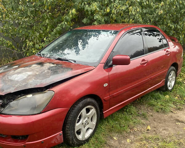 Міцубісі Lancer 2006 у Вышгороде на Automoto.ua Червоний Міцубісі Lancer, об'ємом двигуна 2 л та пробігом 320 тис. км за 2500 $, фото 1 на Automoto.ua