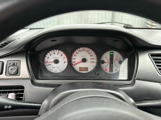 Червоний Міцубісі Lancer, об'ємом двигуна 1.6 л та пробігом 185 тис. км за 5000 $, фото 15 на Automoto.ua
