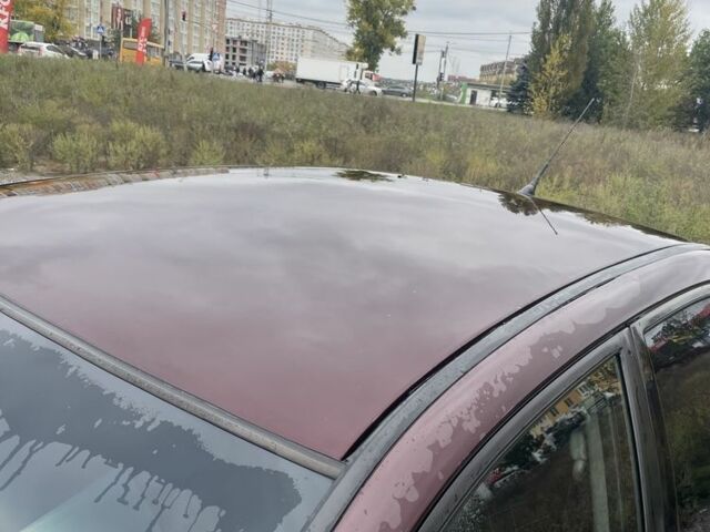 Красный Мицубиси Лансер, объемом двигателя 2 л и пробегом 295 тыс. км за 4150 $, фото 8 на Automoto.ua