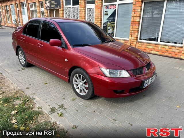 Червоний Міцубісі Lancer, об'ємом двигуна 1.6 л та пробігом 290 тис. км за 4250 $, фото 3 на Automoto.ua