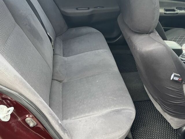 Красный Мицубиси Лансер, объемом двигателя 2 л и пробегом 295 тыс. км за 4150 $, фото 11 на Automoto.ua