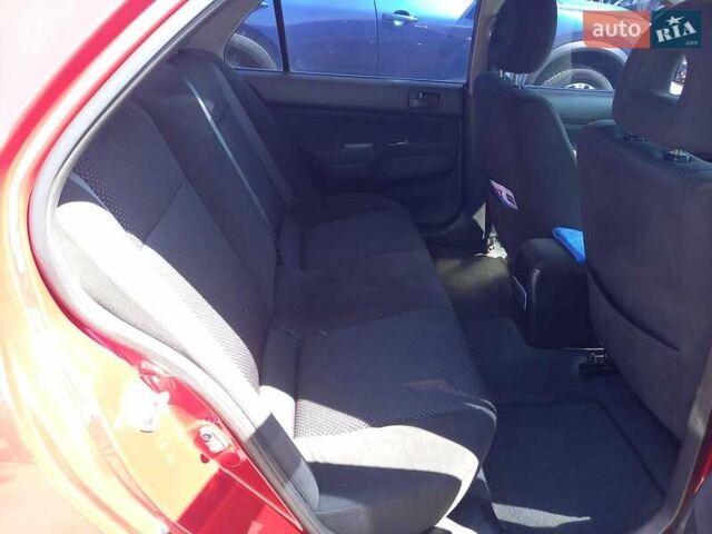 Червоний Міцубісі Lancer, об'ємом двигуна 1.6 л та пробігом 156 тис. км за 5200 $, фото 14 на Automoto.ua