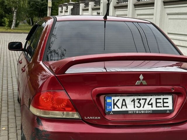 Червоний Міцубісі Lancer, об'ємом двигуна 1.6 л та пробігом 270 тис. км за 2200 $, фото 5 на Automoto.ua