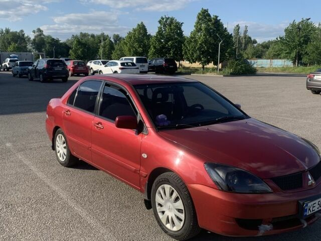Червоний Міцубісі Lancer, об'ємом двигуна 1.6 л та пробігом 490 тис. км за 4000 $, фото 1 на Automoto.ua