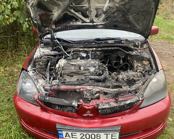 Міцубісі Lancer 2006 у Вышгороде на Automoto.ua Червоний Міцубісі Lancer, об'ємом двигуна 2 л та пробігом 320 тис. км за 2500 $, фото 3 на Automoto.ua