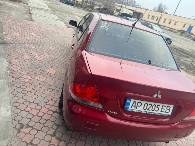 Красный Мицубиси Лансер, объемом двигателя 1.6 л и пробегом 276 тыс. км за 4350 $, фото 5 на Automoto.ua
