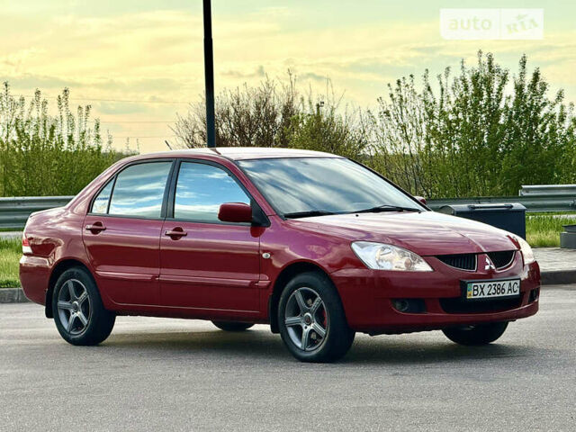 Червоний Міцубісі Lancer, об'ємом двигуна 1.6 л та пробігом 143 тис. км за 6300 $, фото 7 на Automoto.ua