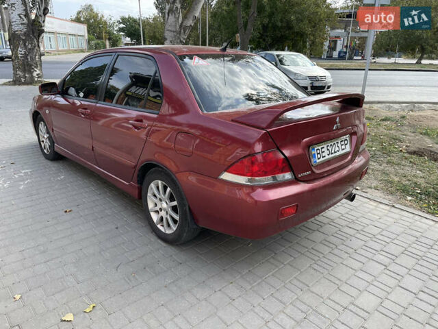 Червоний Міцубісі Lancer, об'ємом двигуна 1.58 л та пробігом 290 тис. км за 4250 $, фото 8 на Automoto.ua