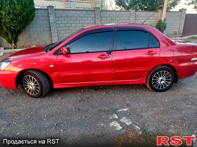 Мицубиси Лансер 2006 в Николаеве на Automoto.ua Красный Мицубиси Лансер, объемом двигателя 1.6 л и пробегом 260 тыс. км за 4600 $, фото 3 на Automoto.ua