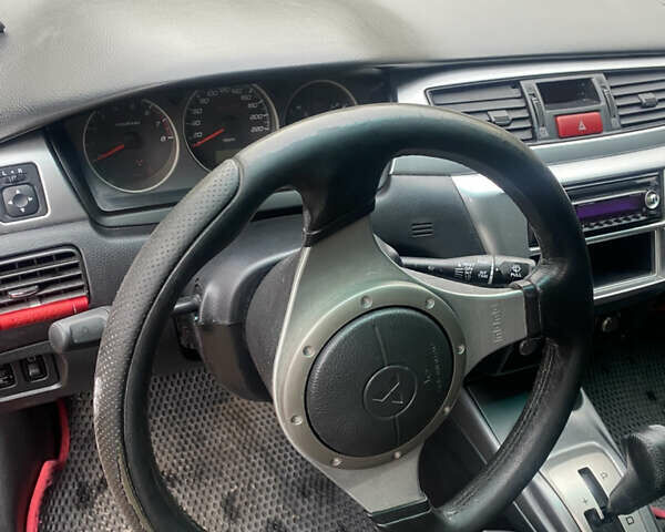 Міцубісі Lancer 2006 у Вышгороде на Automoto.ua Червоний Міцубісі Lancer, об'ємом двигуна 2 л та пробігом 320 тис. км за 2500 $, фото 8 на Automoto.ua